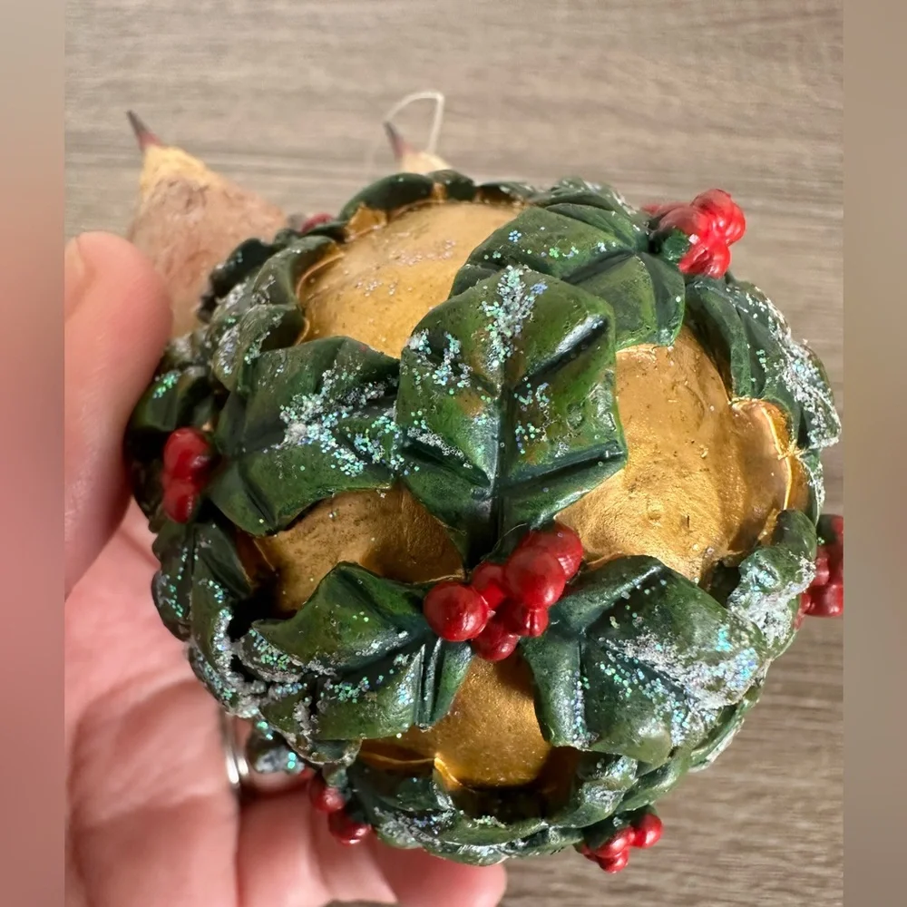 Decorative Bird Ornament with Green and Gold Accents